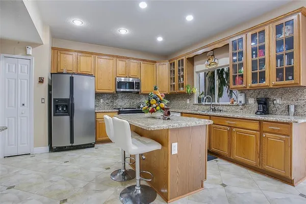 $675,000 | 7866 Bardmoor Hill Circle, Orlando, FL 32835