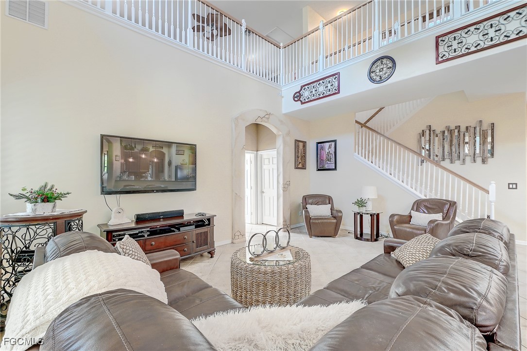 12890 Timber Ridge Drive Fort Myers, FL 33913 - Photo 12 of 39 a bedroom with furniture and a couch