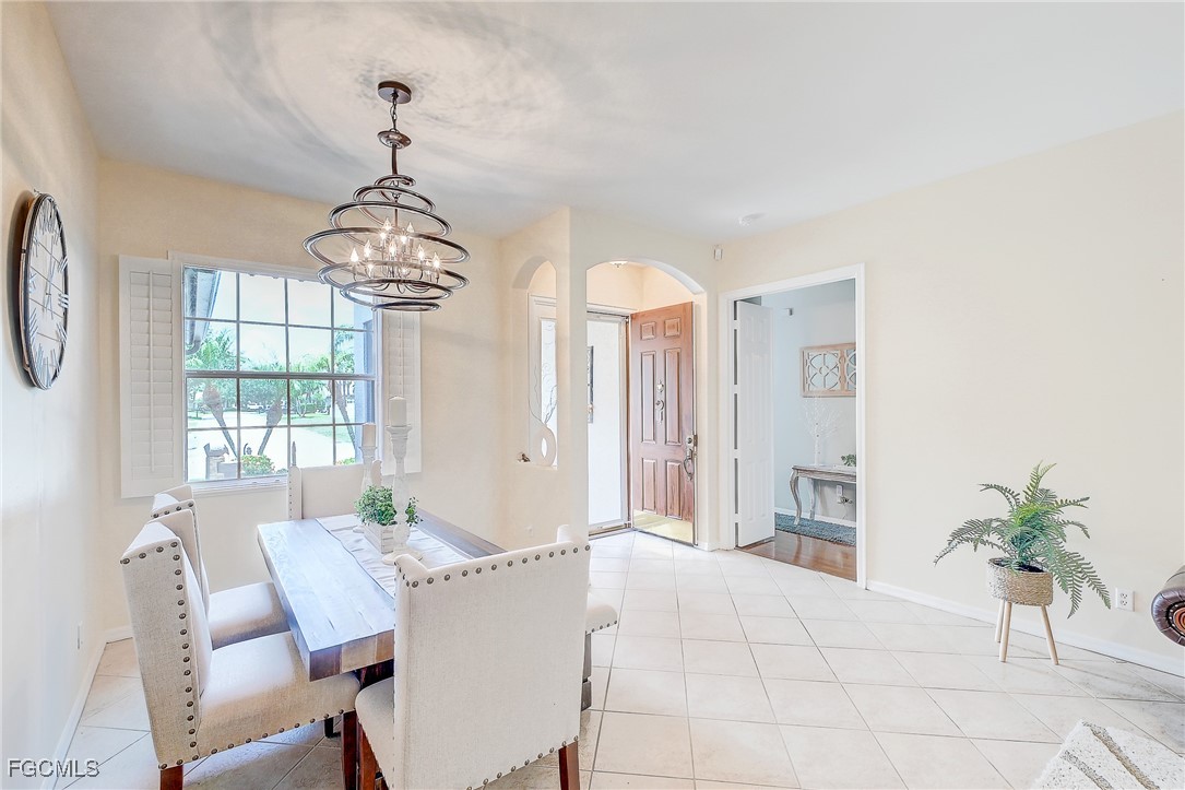 12890 Timber Ridge Drive Fort Myers, FL 33913 - Photo 16 of 39 a view of a dining room with furniture window and outside view