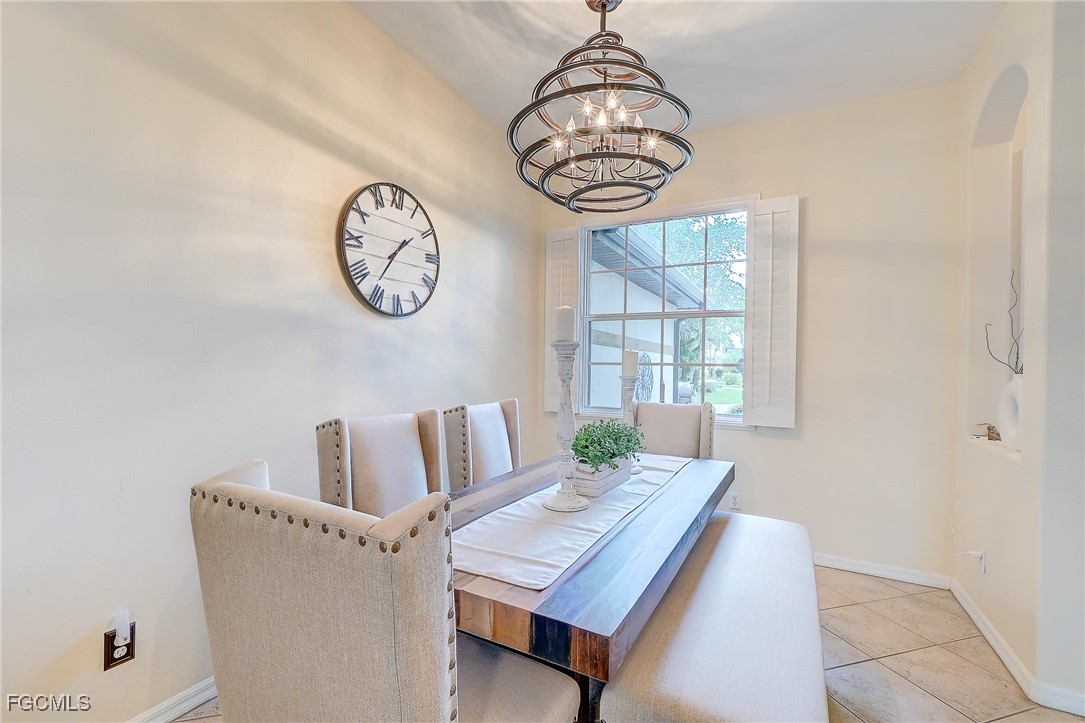 12890 Timber Ridge Drive Fort Myers, FL 33913 - Photo 17 of 39 a view of a very nice looking dining room with a window