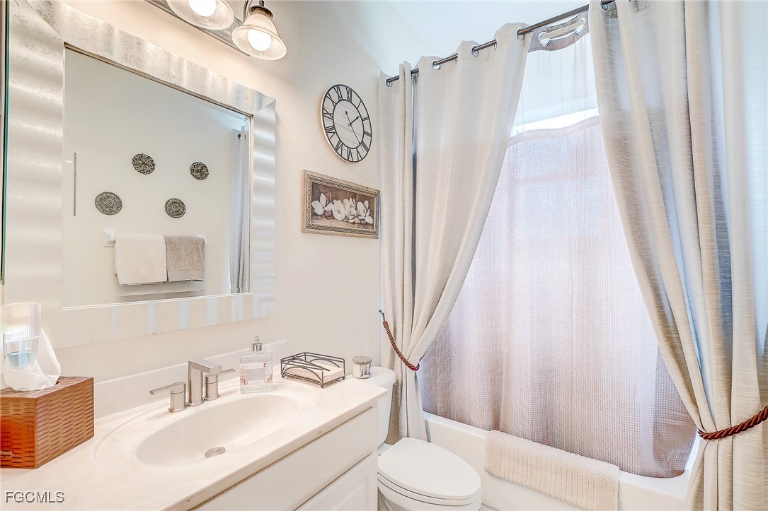 12890 Timber Ridge Drive Fort Myers, FL 33913 - Photo 24 of 39 a bathroom with a sink toilet and shower