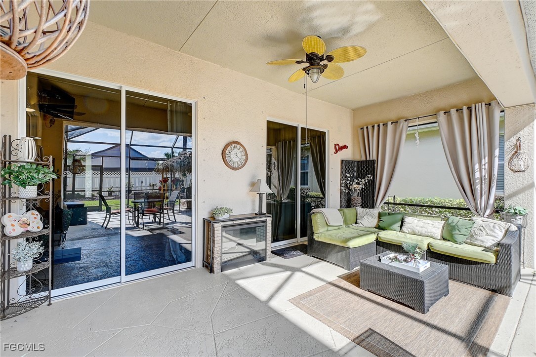 12890 Timber Ridge Drive Fort Myers, FL 33913 - Photo 30 of 39 a living room with furniture and a window