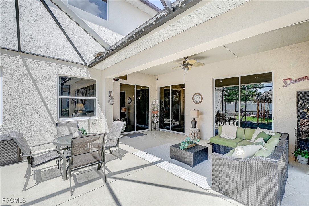 12890 Timber Ridge Drive Fort Myers, FL 33913 - Photo 32 of 39 a living room with furniture and large window
