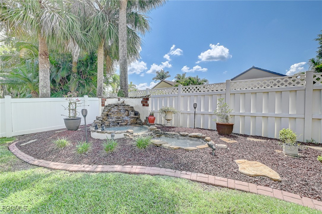 12890 Timber Ridge Drive Fort Myers, FL 33913 - Photo 33 of 39 a view of a house with a patio
