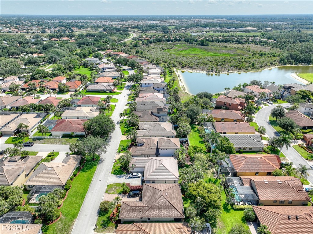 12890 Timber Ridge Drive Fort Myers, FL 33913 - Photo 34 of 39 an aerial view of a city with lake view