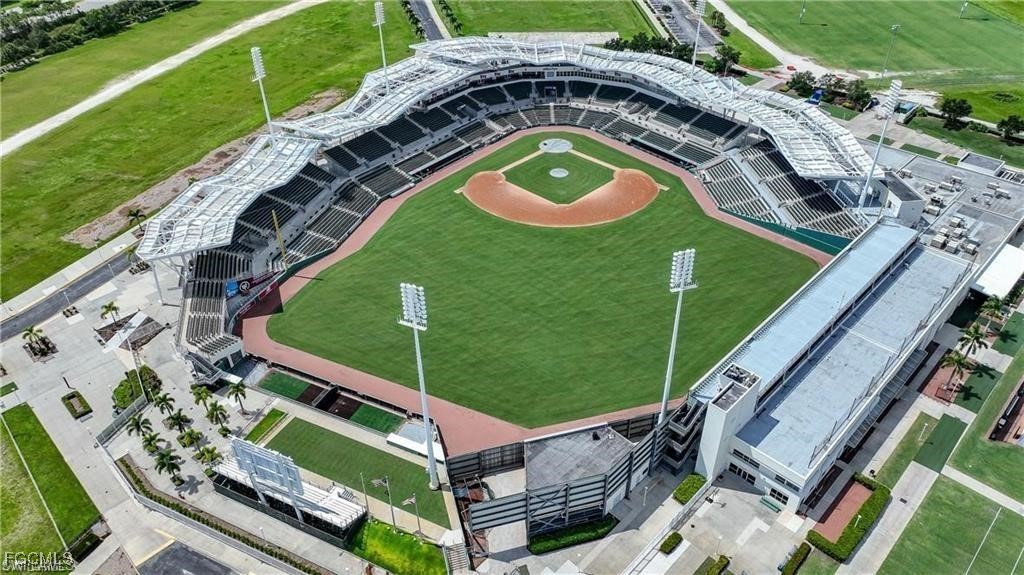 12890 Timber Ridge Drive Fort Myers, FL 33913 - Photo 36 of 39 aerial view of a house with a garden and plants