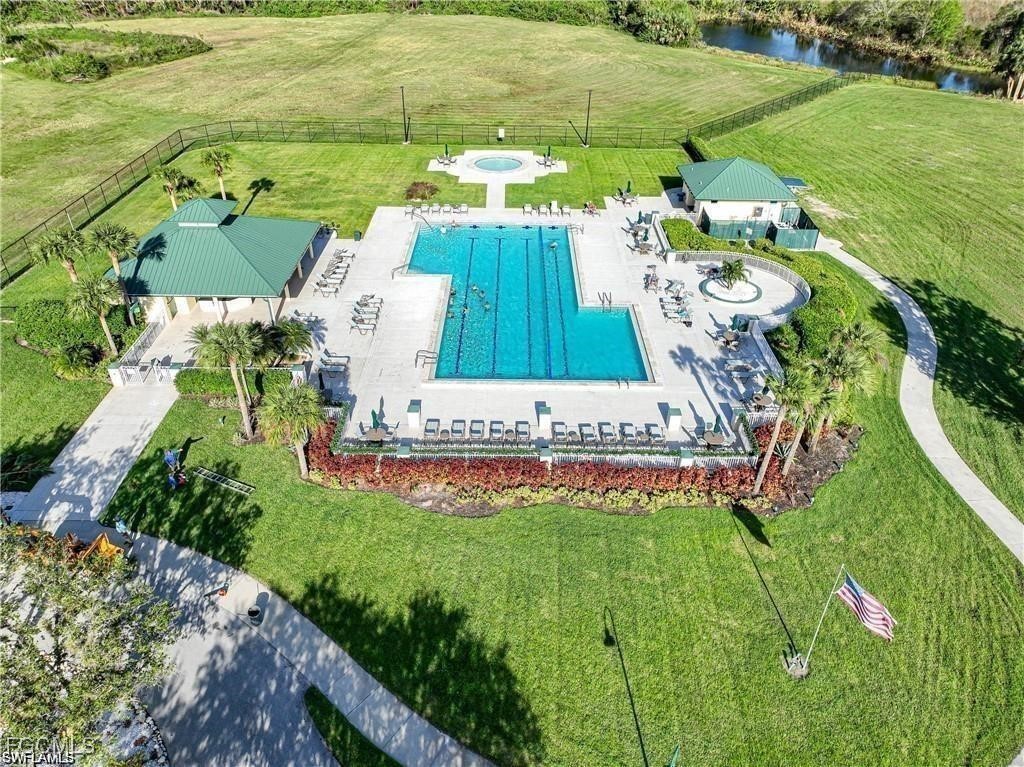 12890 Timber Ridge Drive Fort Myers, FL 33913 - Photo 37 of 39 a view of a garden with an ocean