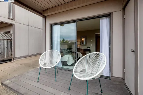 a view of a livingroom with furniture and wooden floor