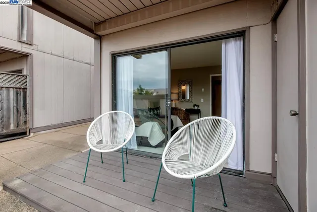 a view of a livingroom with furniture and wooden floor