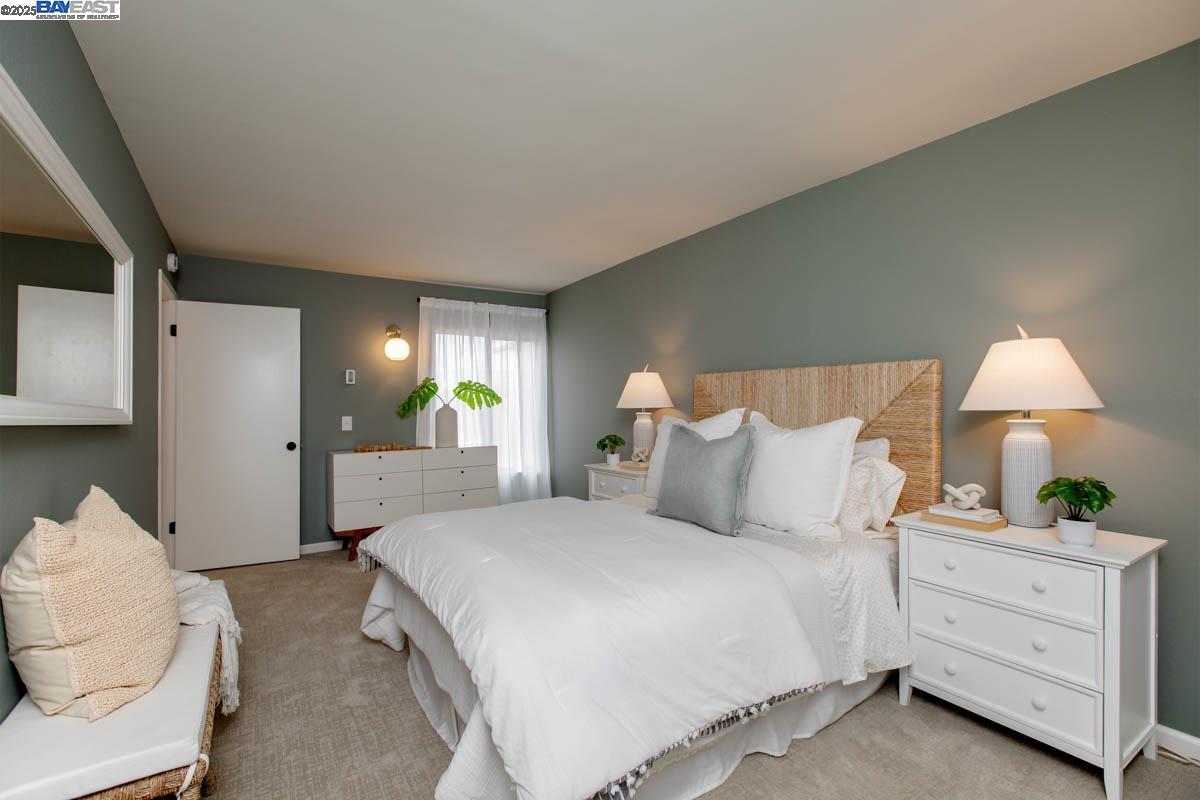 2101 Shore Line Drive, Unit 475 Alameda, CA 94501 - Photo 31 of 37 a bedroom with bed and a potted plant