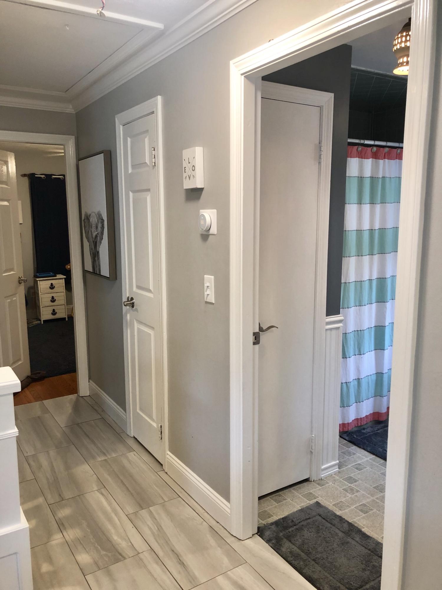 57 Anchor Lane Cotuit, MA 02635 - Photo 11 of 29 a bathroom with a shower and a mirror