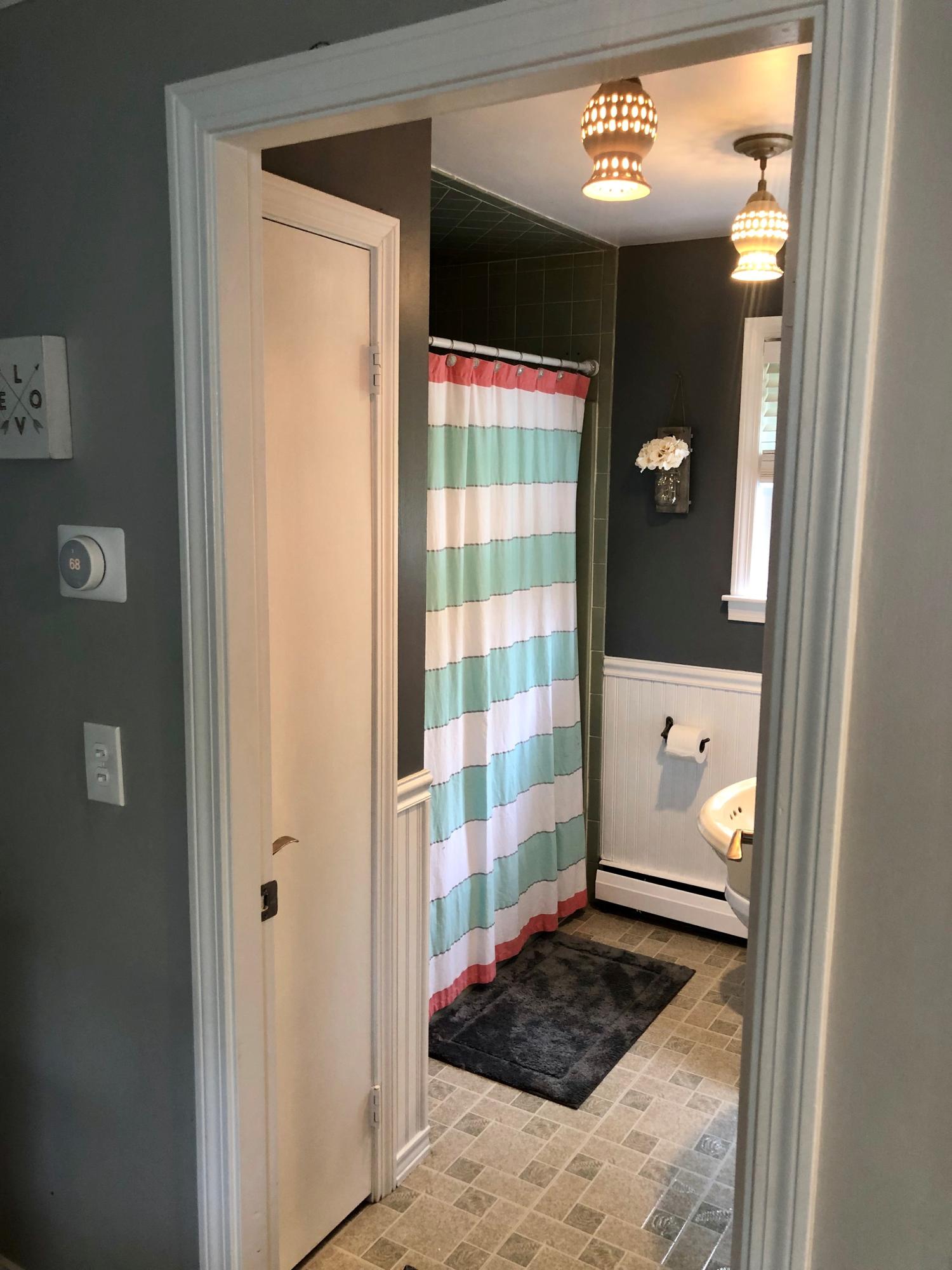 57 Anchor Lane Cotuit, MA 02635 - Photo 12 of 29 a view of a hallway with a elevator