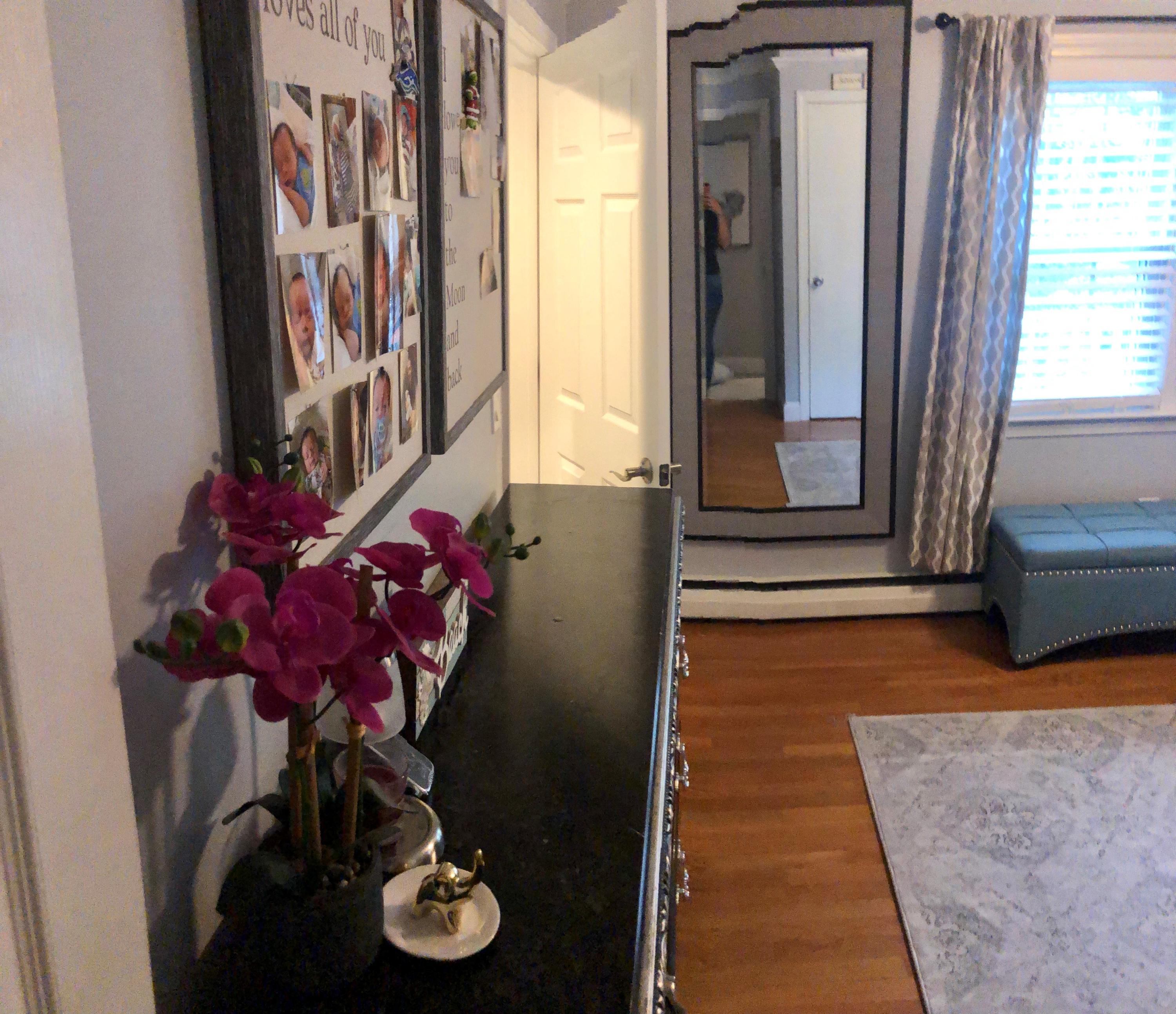 57 Anchor Lane Cotuit, MA 02635 - Photo 14 of 29 a living room with furniture and a potted plant