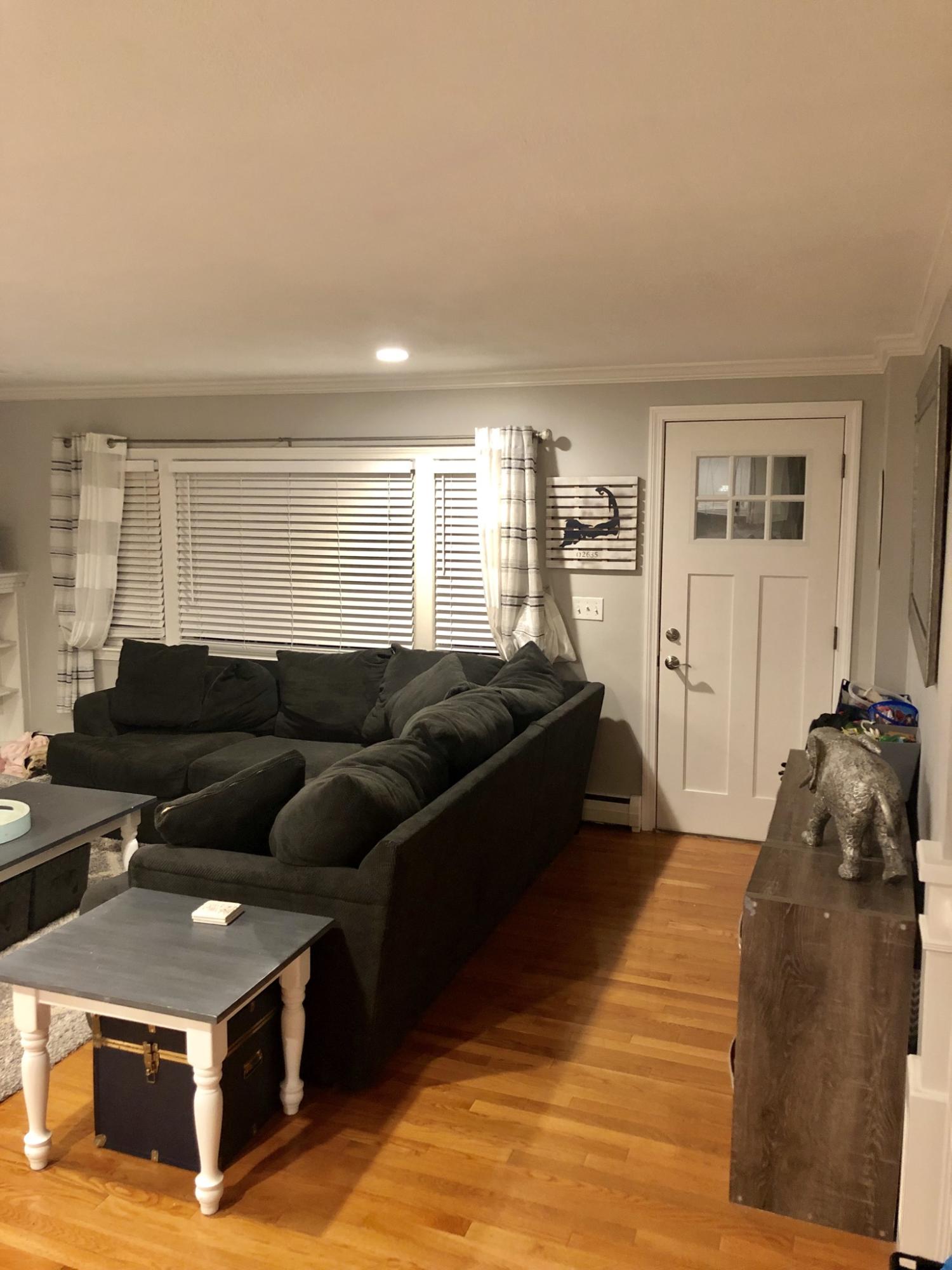 57 Anchor Lane Cotuit, MA 02635 - Photo 9 of 29 a living room with furniture and a flat screen tv