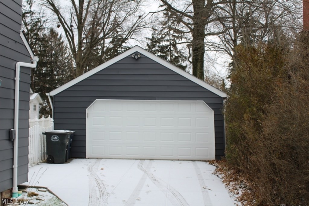 5192 Edenhurst Road Cleveland, OH 44124 - Photo 28 of 32 The nice sized 2 1/2 car garage provides storage cabinets, a work bench, and great storage space.
