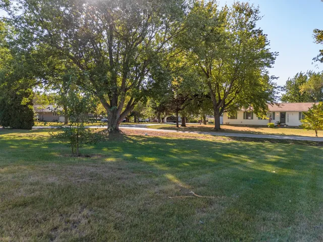 a view of a house with a big yard