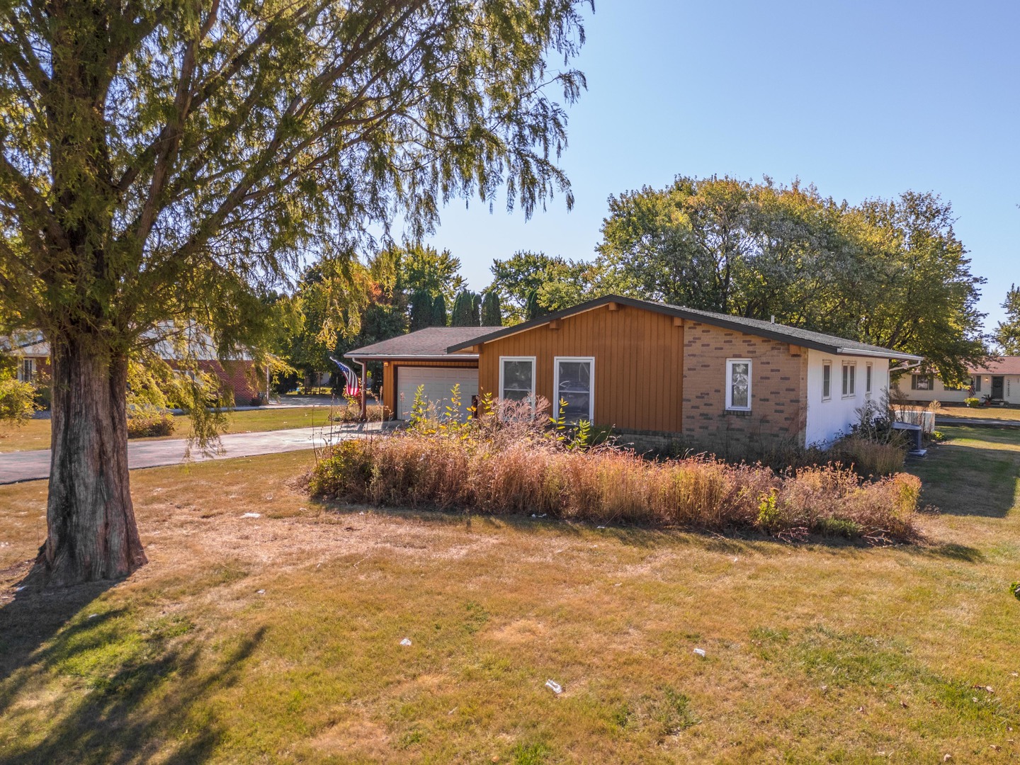 504 West Jackson Street Cullom, IL 60929 - Photo 19 of 51 a view of a house with a yard