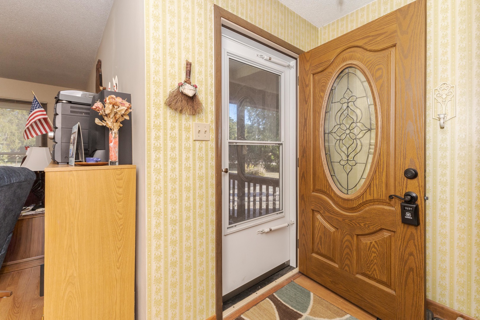 504 West Jackson Street Cullom, IL 60929 - Photo 24 of 51 a front view of a house with a door and a window