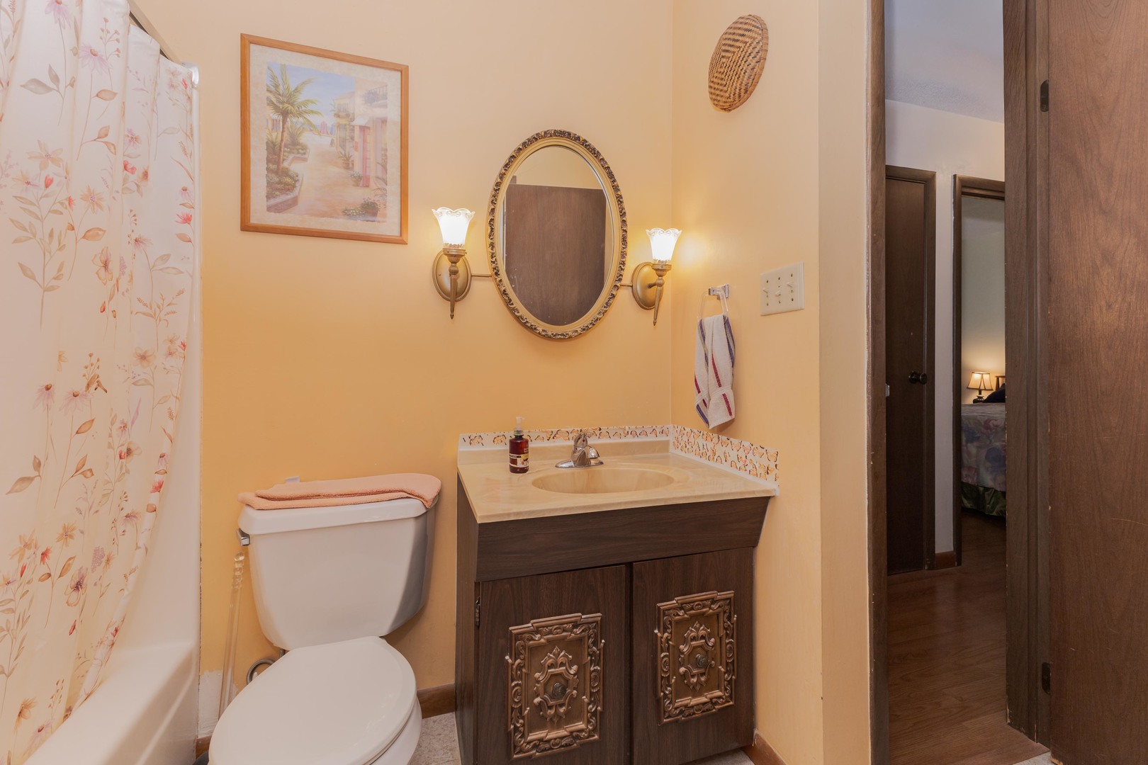 504 West Jackson Street Cullom, IL 60929 - Photo 33 of 51 a bathroom with a toilet sink and mirror