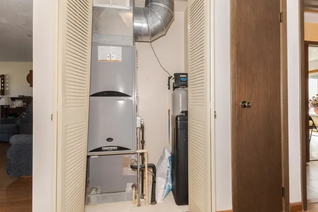 a view of a livingroom with furniture and a window