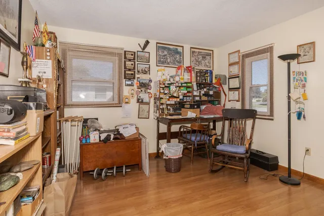 a view of a livingroom with furniture and wooden floor