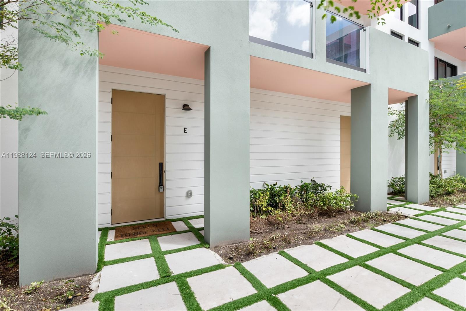 721 Southwest 11th Street, Unit E Miami, FL 33129 - Photo 1 of 26 a view of house with backyard