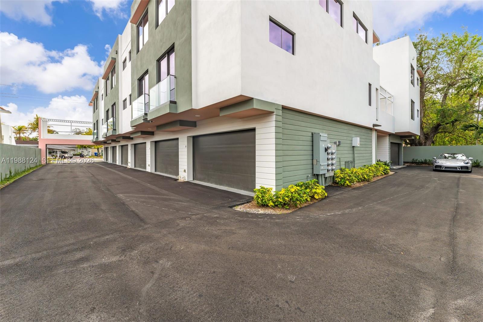 721 Southwest 11th Street, Unit E Miami, FL 33129 - Photo 24 of 26 front view of a house with a street