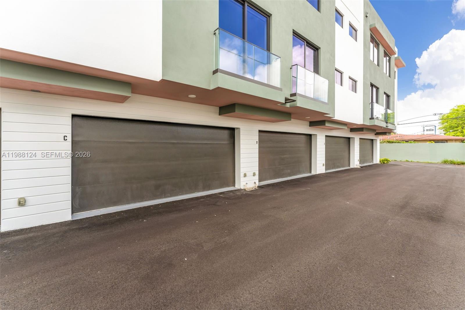 721 Southwest 11th Street, Unit E Miami, FL 33129 - Photo 6 of 26 a view of a building with a street