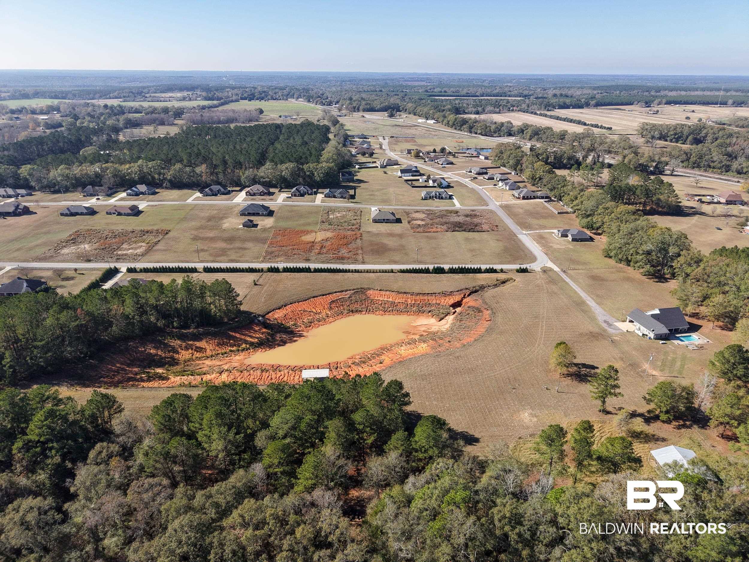 0 Stokley Court Atmore, AL 36502 - Photo 10 of 22 Aerial view of property and surrounding area with rural landscape