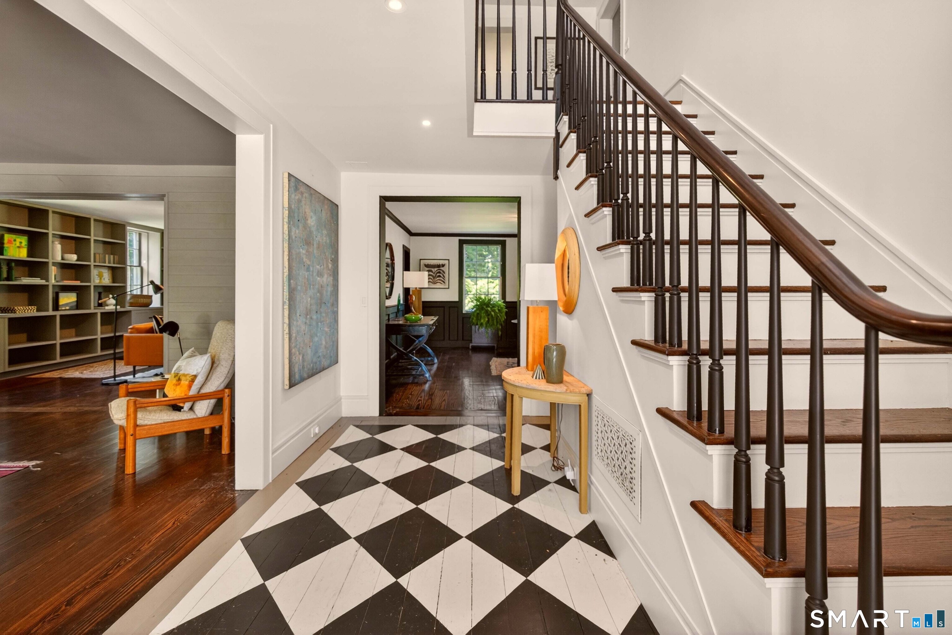 100 North Main Street Kent, CT 06757 - Photo 11 of 40 a view of a hallway with wooden floor and stairs