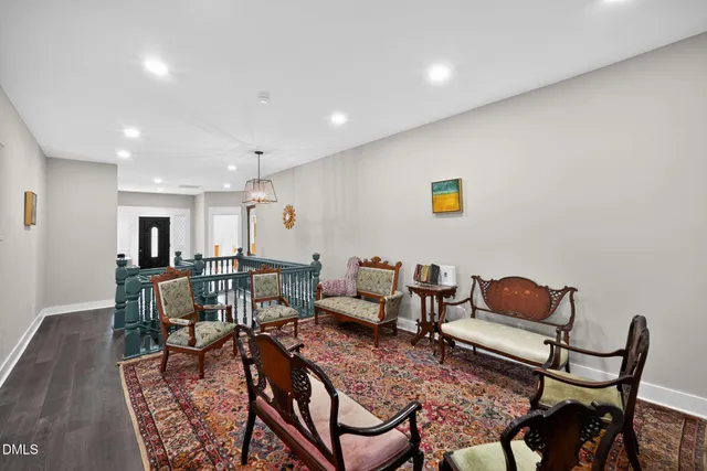 a kitchen with stainless steel appliances and white cabinets