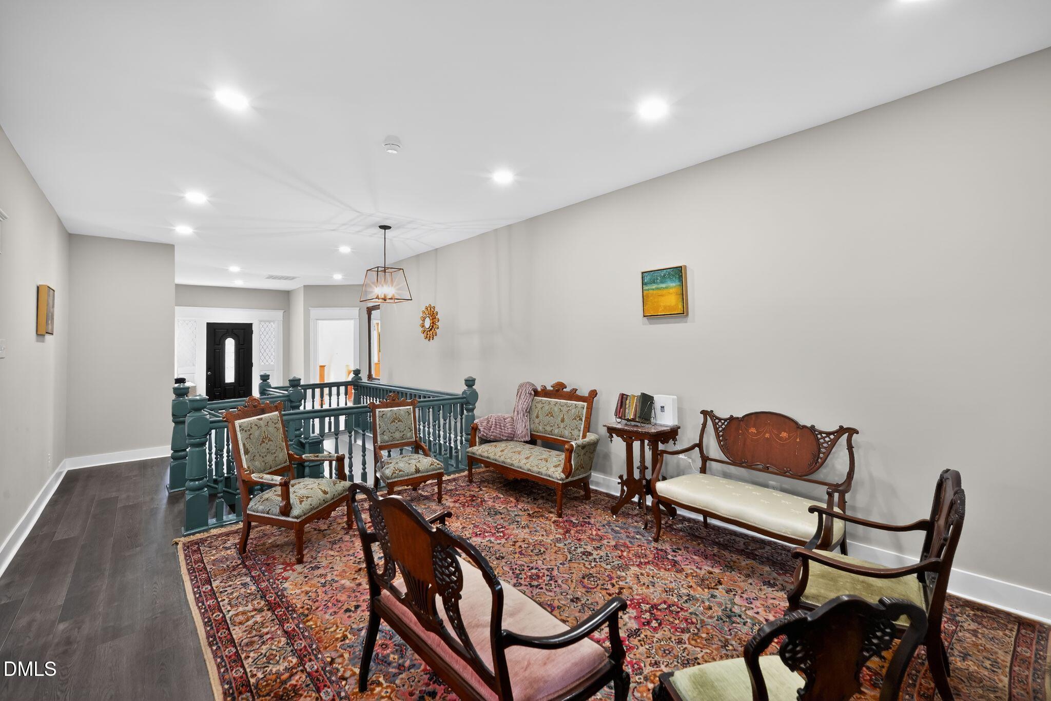 6325 Whitted Road Fuquay-Varina, NC 27526 - Photo 14 of 57 a living room with furniture and a rug