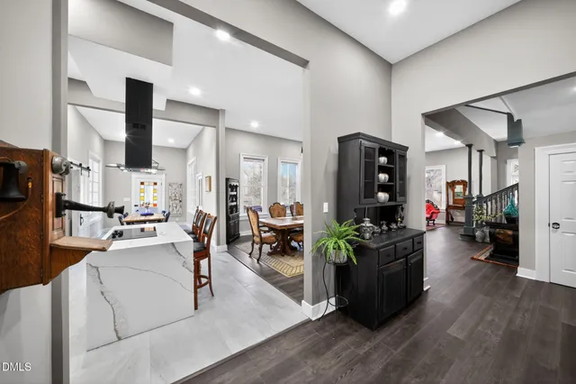 a kitchen with a sink a stove and cabinets