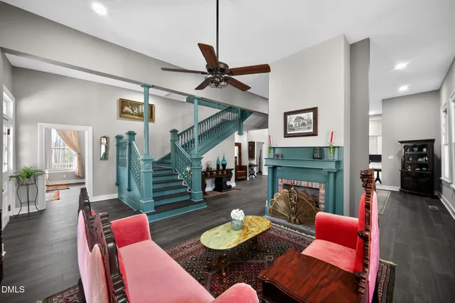 a large kitchen with a table and chairs
