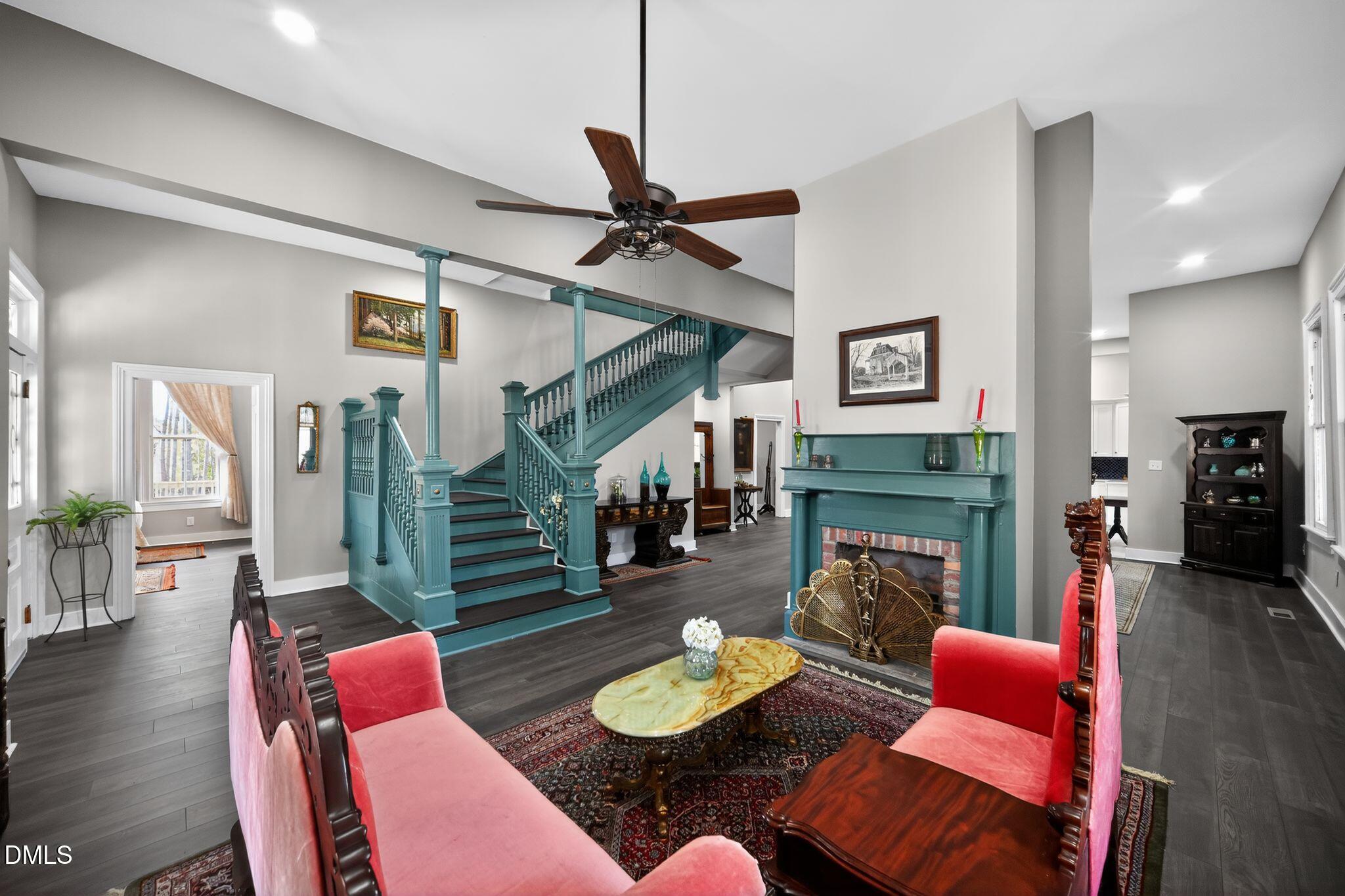 6325 Whitted Road Fuquay-Varina, NC 27526 - Photo 16 of 57 a living room with furniture and wooden floor