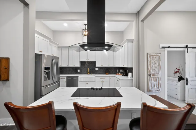 a view of a dining room with furniture