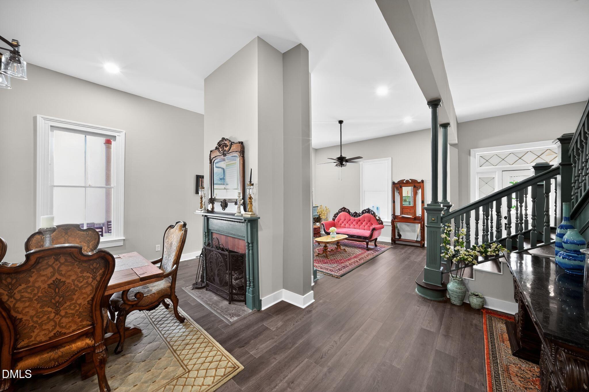 6325 Whitted Road Fuquay-Varina, NC 27526 - Photo 25 of 57 a living room with furniture and a wooden floor