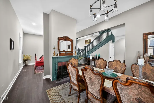 a bed room with a bed and a chandelier