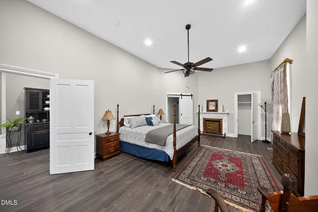 a bed room with a bed and a window