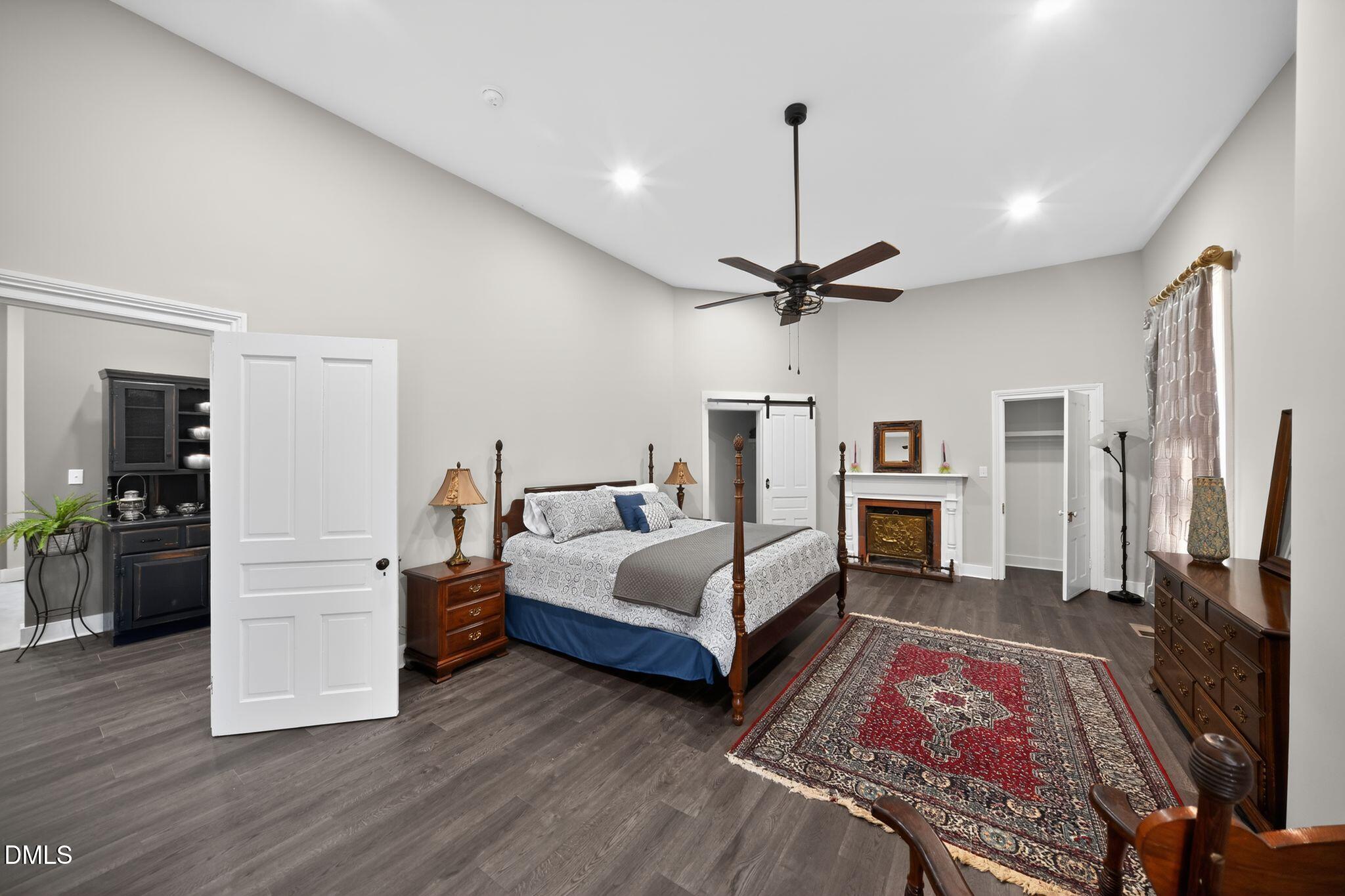 6325 Whitted Road Fuquay-Varina, NC 27526 - Photo 29 of 57 a bedroom with furniture and a flat screen tv