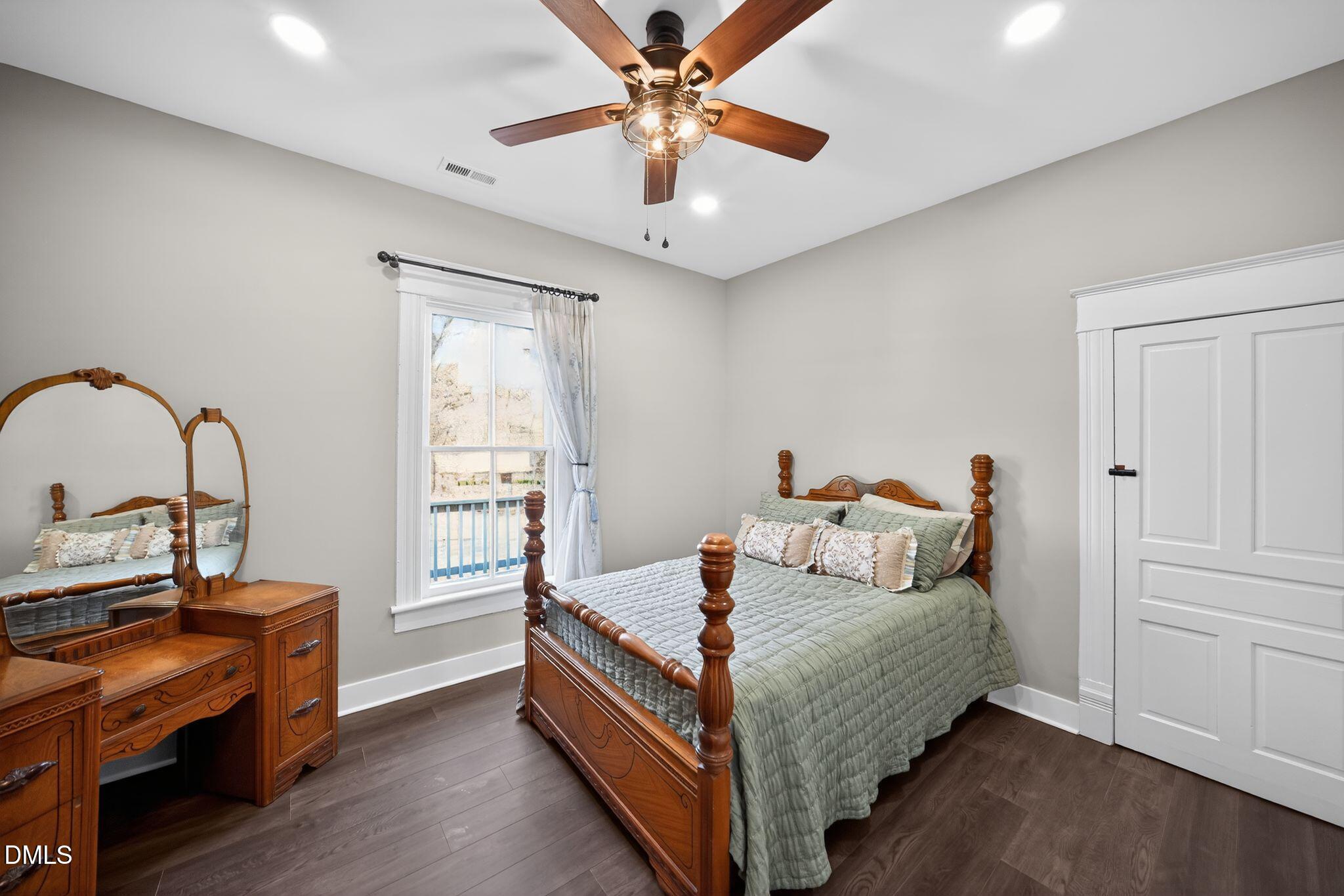 6325 Whitted Road Fuquay-Varina, NC 27526 - Photo 32 of 57 a bed room with a bed and a window