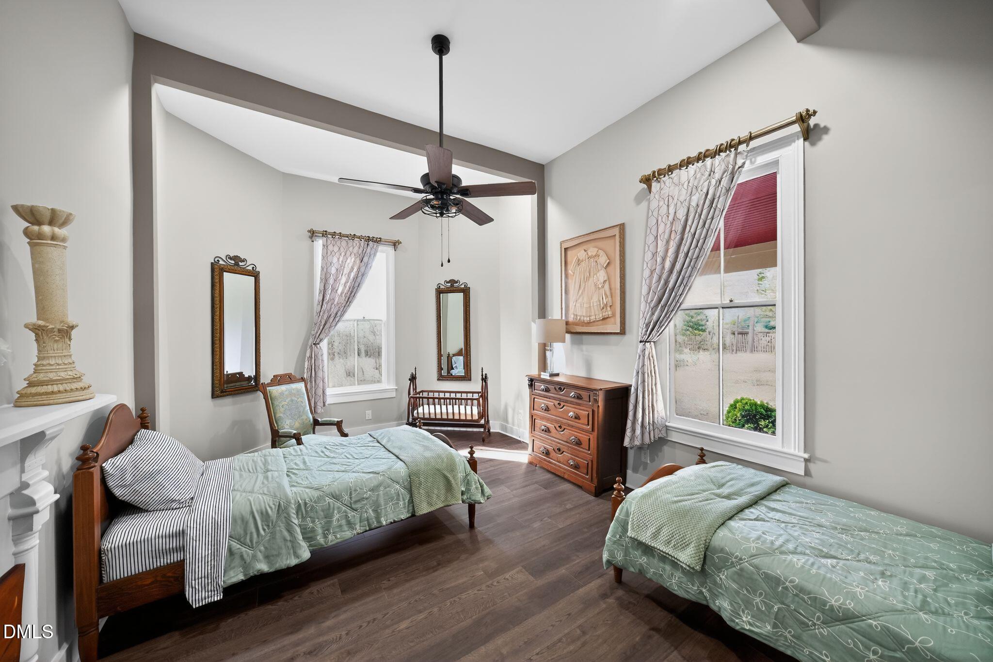 6325 Whitted Road Fuquay-Varina, NC 27526 - Photo 41 of 57 a bedroom with a bed wooden floor and window