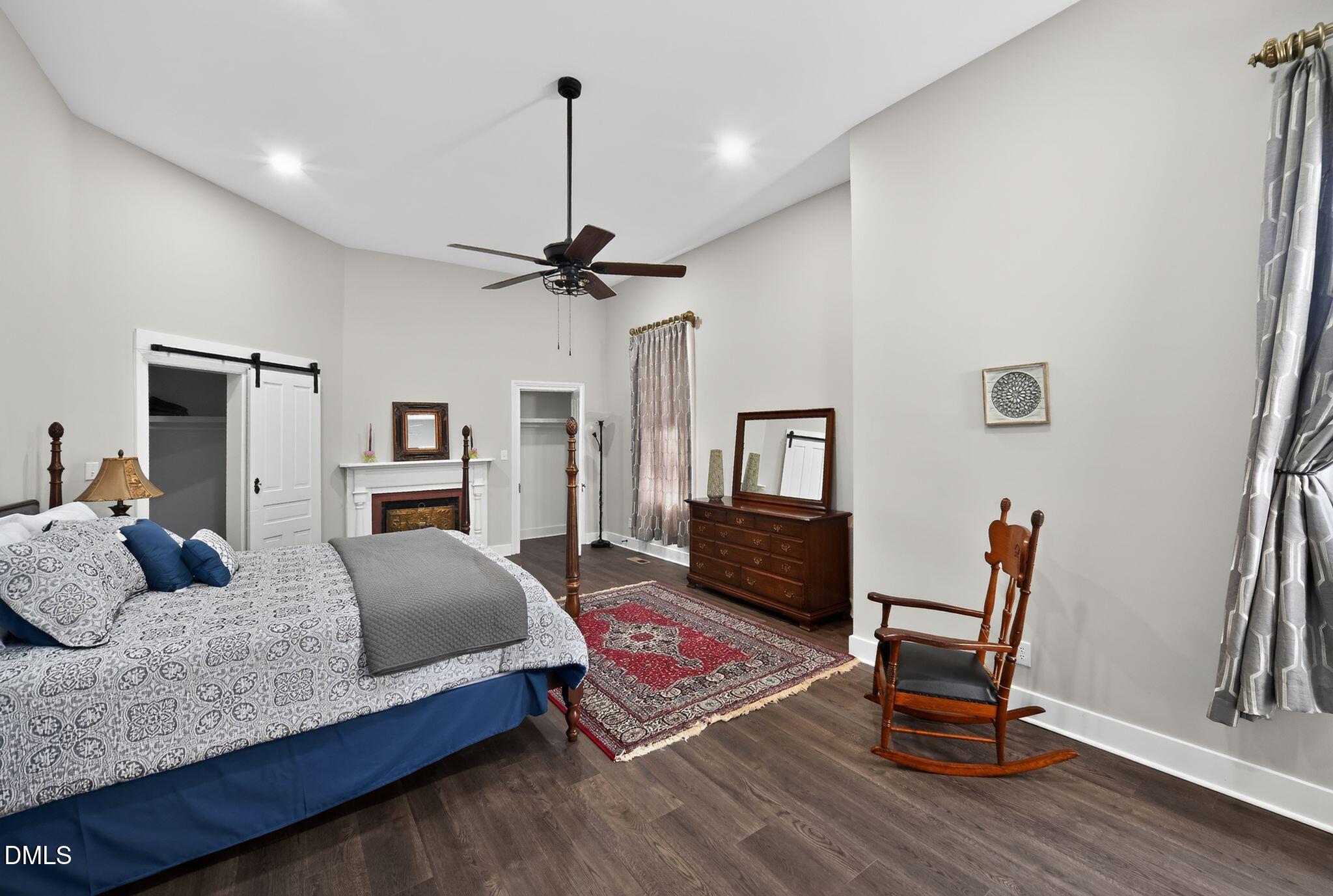 6325 Whitted Road Fuquay-Varina, NC 27526 - Photo 43 of 57 a bedroom with furniture and a wooden floor