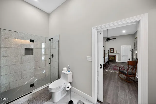 a view of a living room and wooden floor