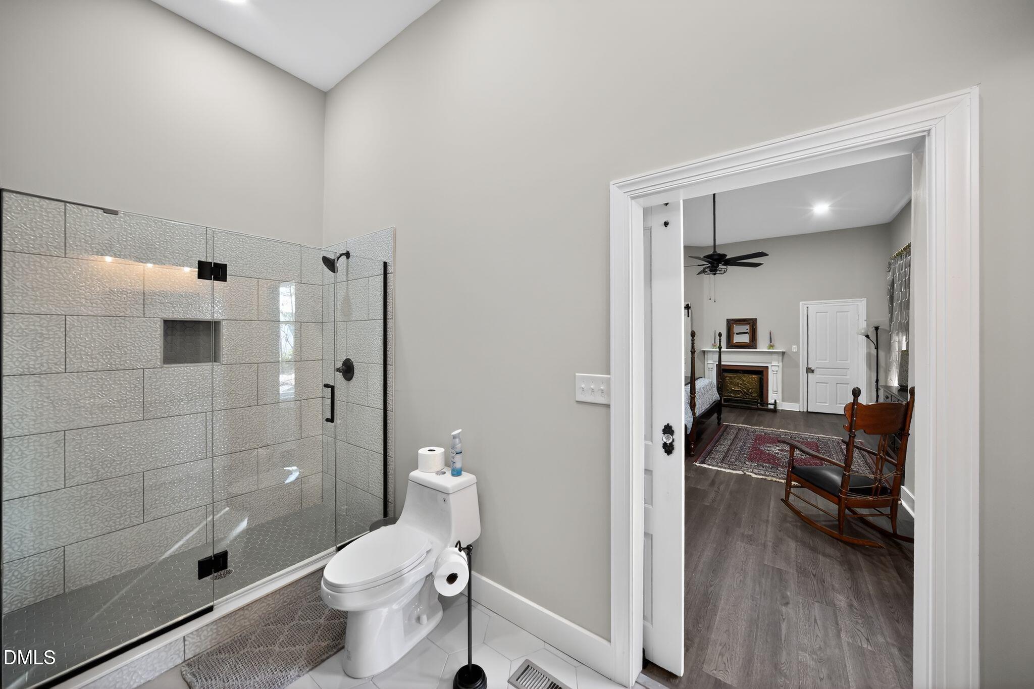6325 Whitted Road Fuquay-Varina, NC 27526 - Photo 46 of 57 a bathroom with a sink toilet and shower
