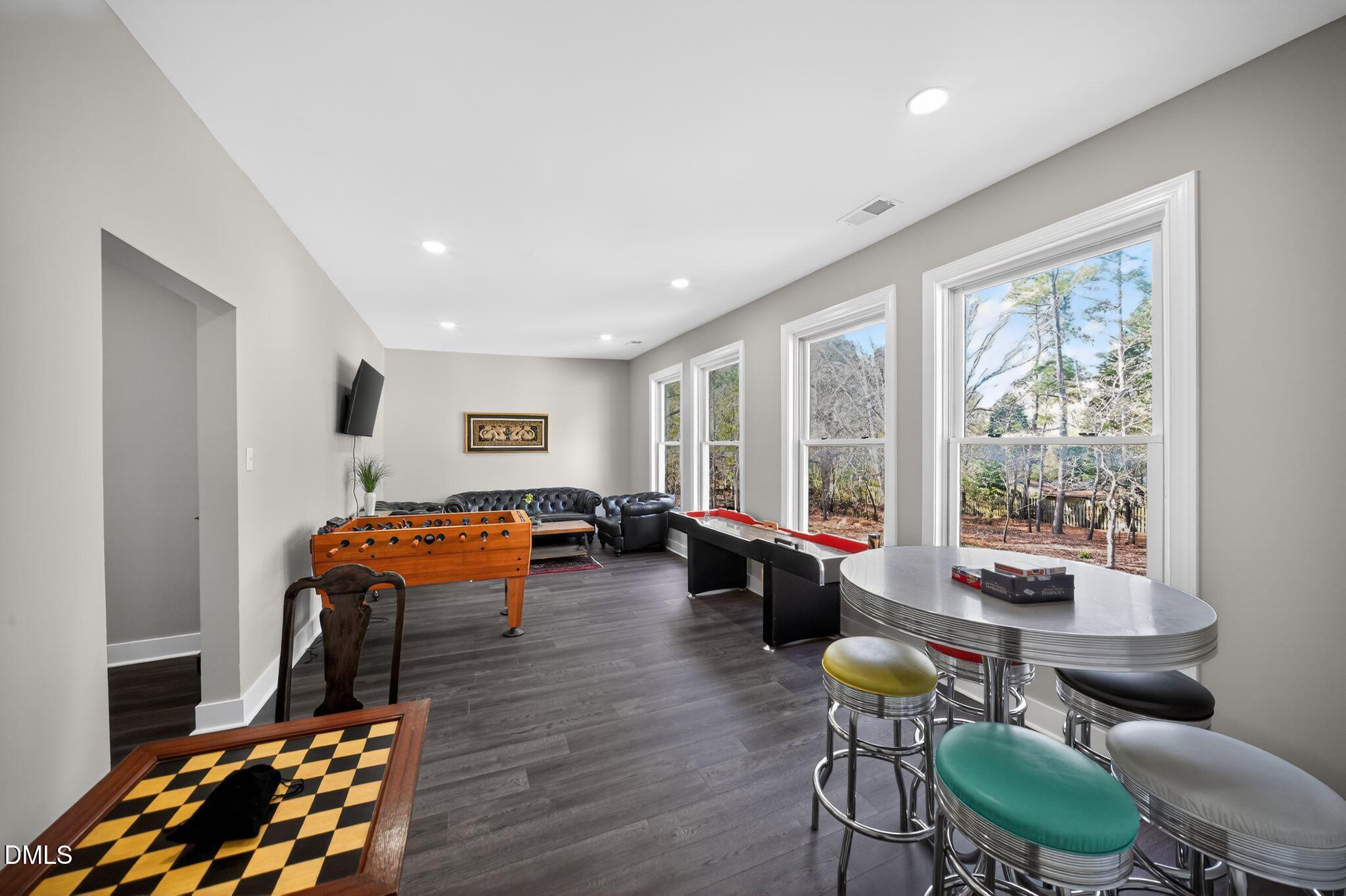 6325 Whitted Road Fuquay-Varina, NC 27526 - Photo 50 of 57 a living room with furniture and a window