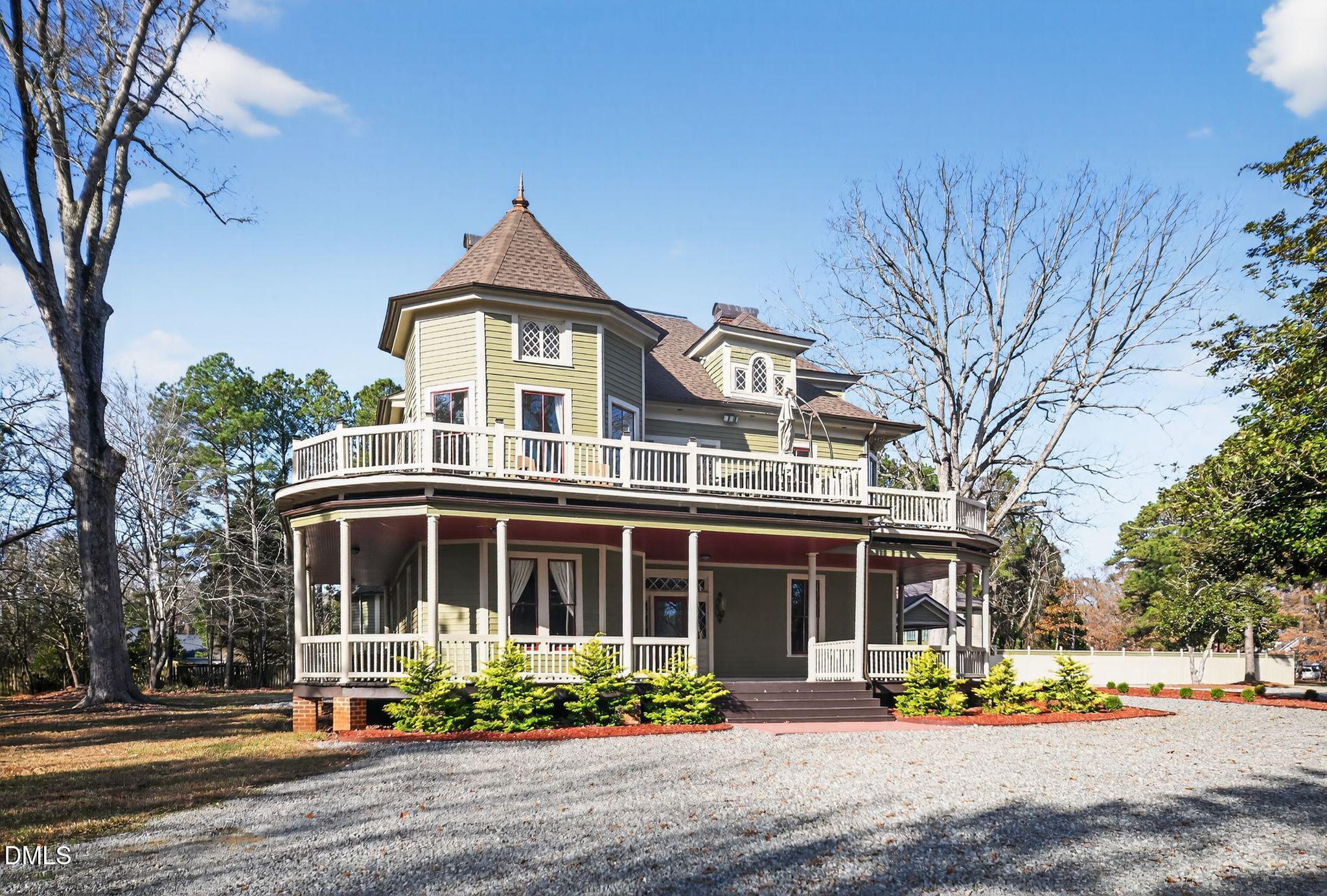 6325 Whitted Road Fuquay-Varina, NC 27526 - Photo 7 of 57 a front view of a house with a yard