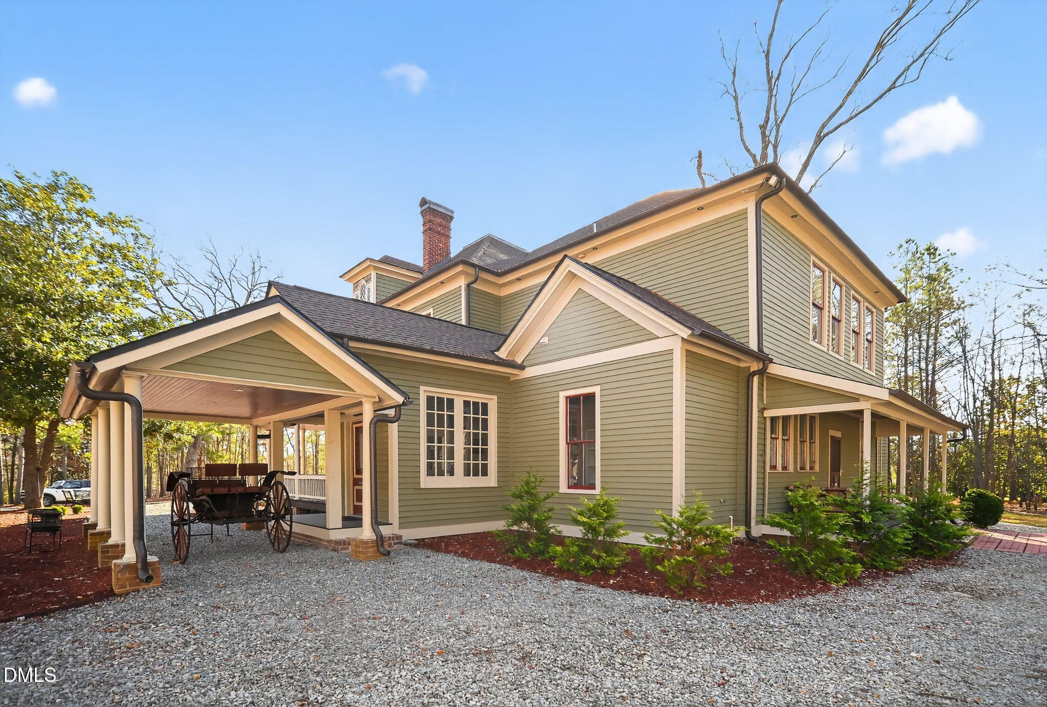 6325 Whitted Road Fuquay-Varina, NC 27526 - Photo 9 of 57 a view of a house with a patio