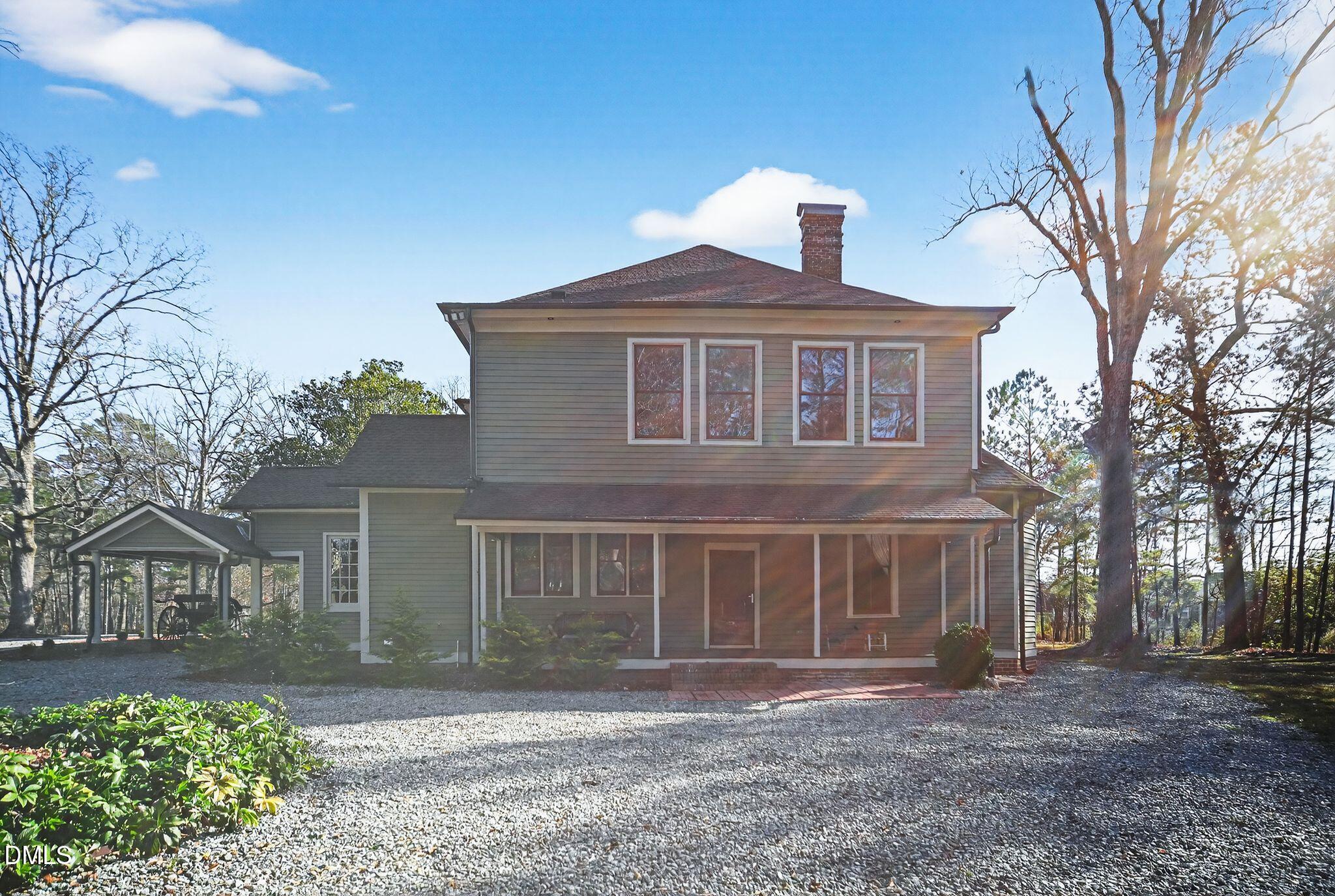 6325 Whitted Road Fuquay-Varina, NC 27526 - Photo 10 of 57 a front view of a house with a yard