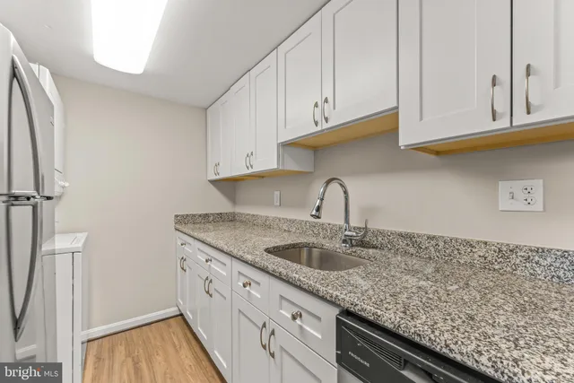 a kitchen with a stove and a microwave